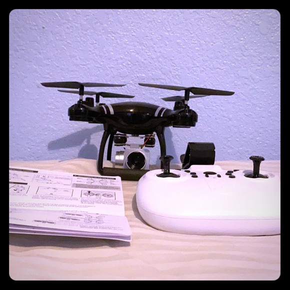 I am selling a drone with hd camera and controller - Picture 1 of 5